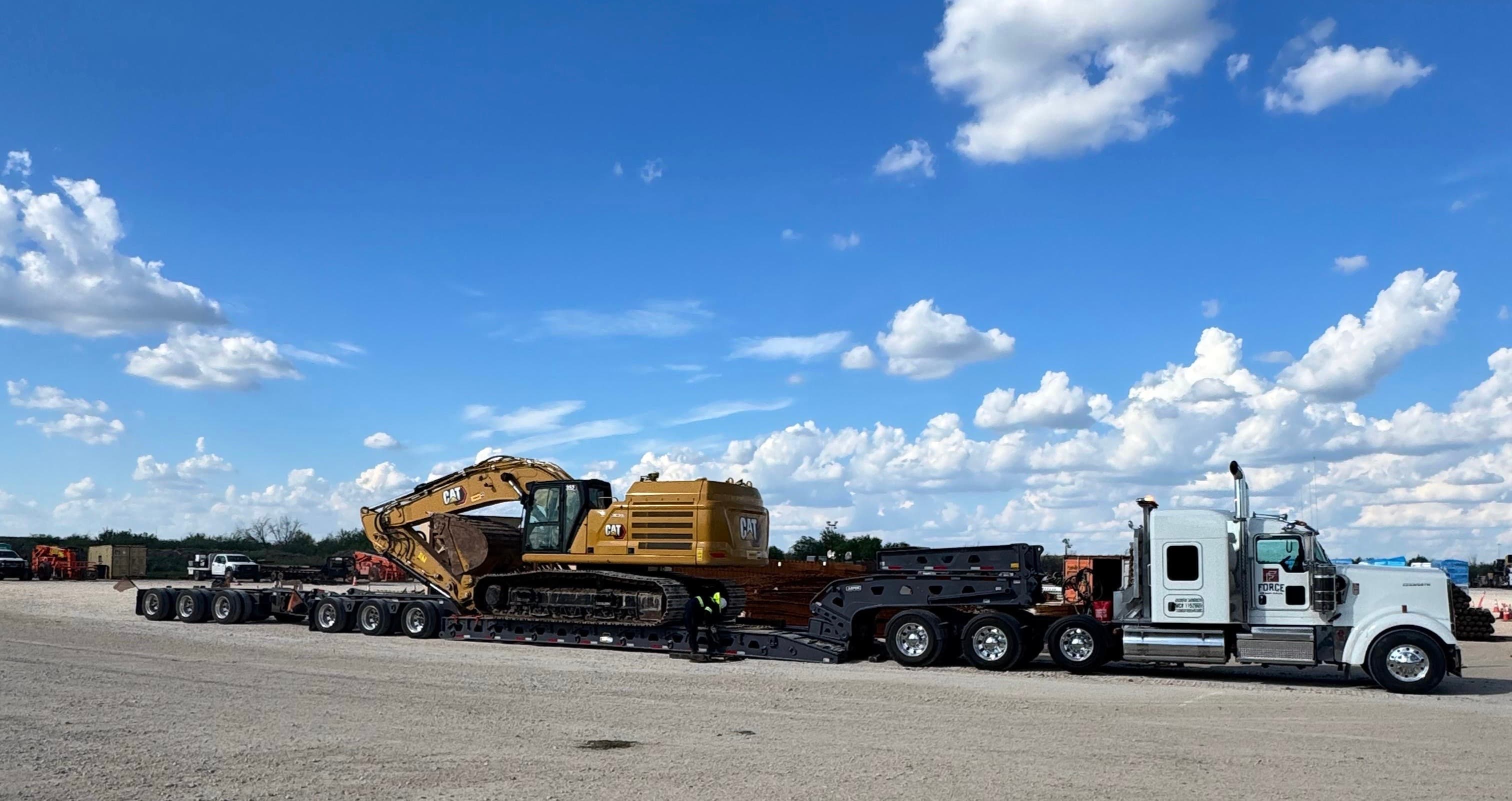 Force heavy haul transport CAT excavator Texas